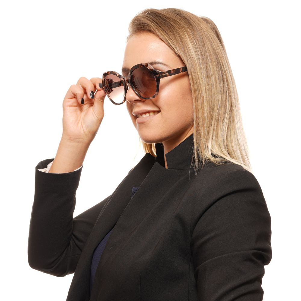 Women's brown sunglasses with 55mm lenses, 19mm bridge, and 140mm temples