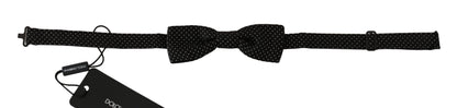 Dolce & Gabbana Elegant Black Polka Dot Silk Bow Tie on mannequin 