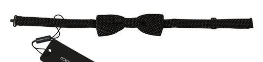 Dolce & Gabbana Elegant Black Polka Dot Silk Bow Tie on mannequin 