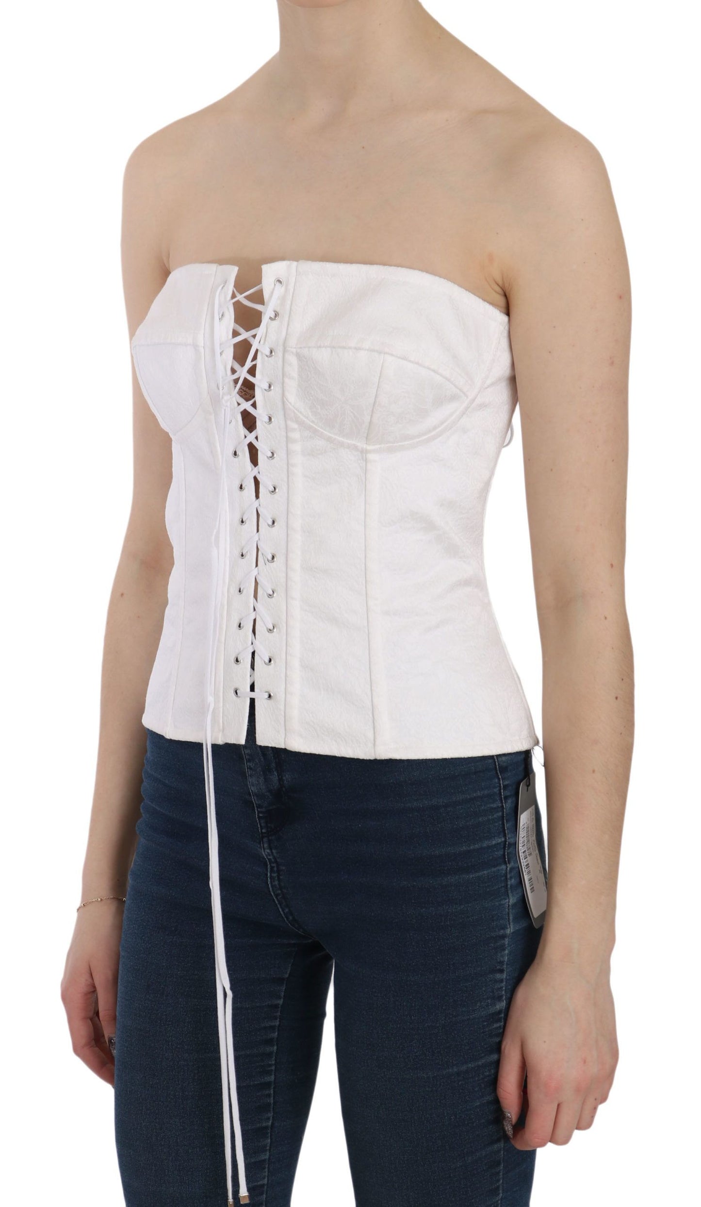 White corset top with fitted silhouette and subtle logo details