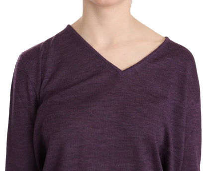  Indulge in the epitome of sophistication with this beautiful purple blouse 