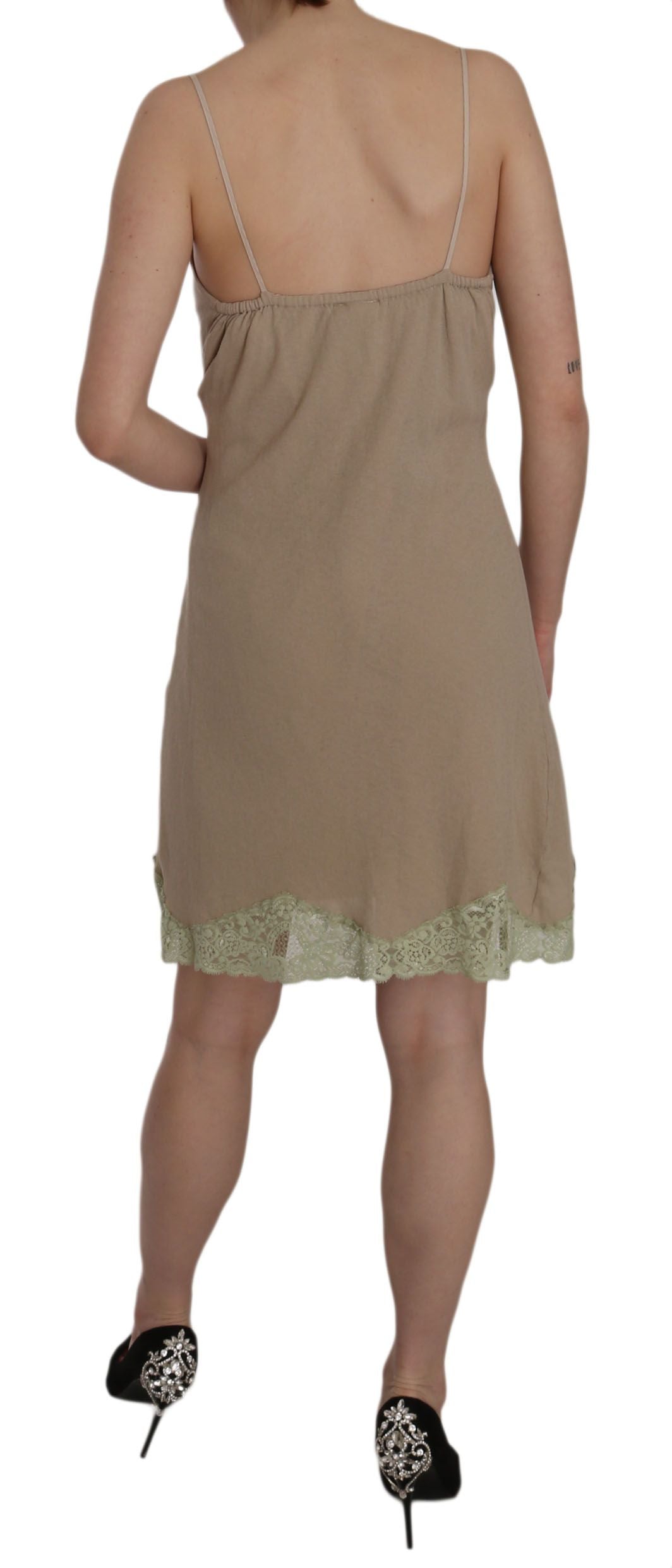 Beige lace mini dress with intricate lacework and chic spaghetti strap design