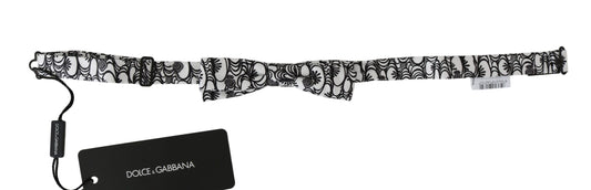 Exquisite 100% silk Dolce & Gabbana bow tie in elegant white and black pattern, made in Italy with adjustable neck strap for all sizes