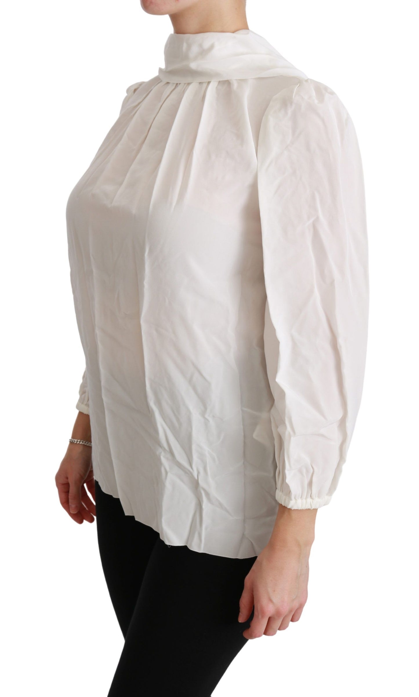 Classic style and comfort in the White Silk Turtle Neck Blouse