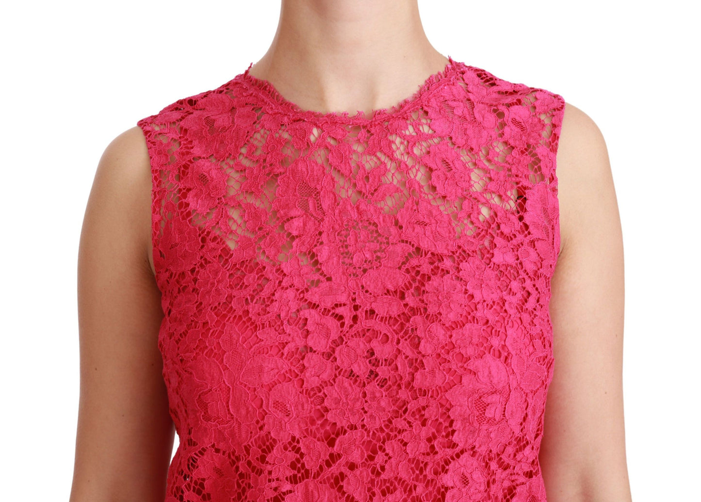 Dolce & Gabbana’s Shocking Pink Mini Bodycon Dress is made with a vibrant Pink Shocking color, and a lining of 76% Silk, 16% Cotton, 6% Elastane, 4% Nylon