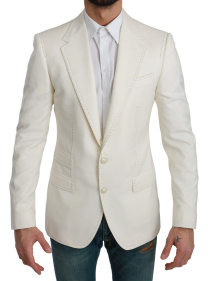 Discover timeless sophistication with our Dolce &amp; Gabbana virgin wool blazer crafted in Italy