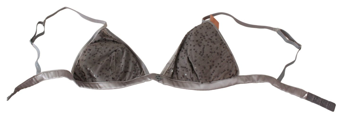 Sumptuous blend of materials, providing both comfort and elegance, with single hook closure and iconic logo