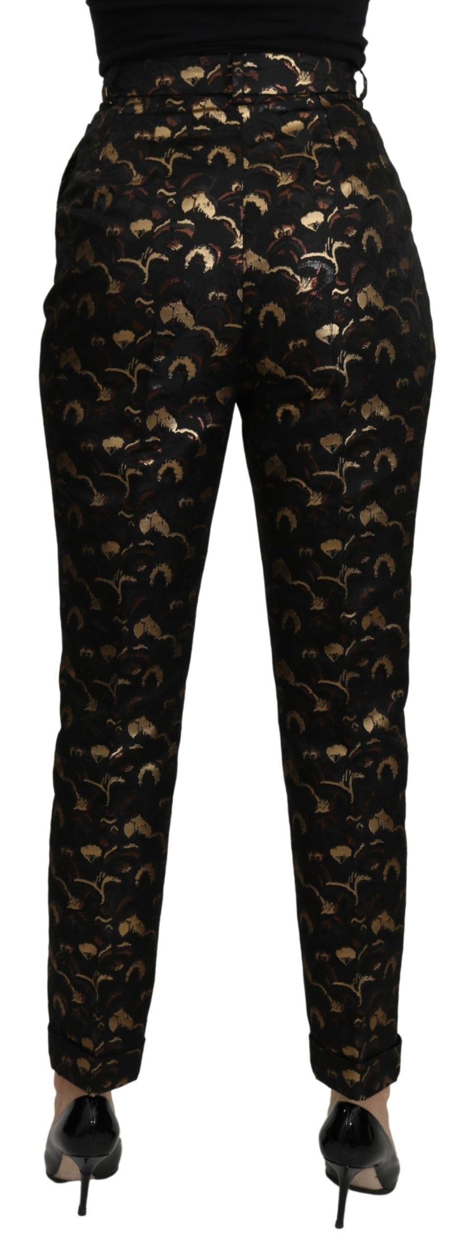 Luxurious high-waisted brocade pants with a stunning black and gold design