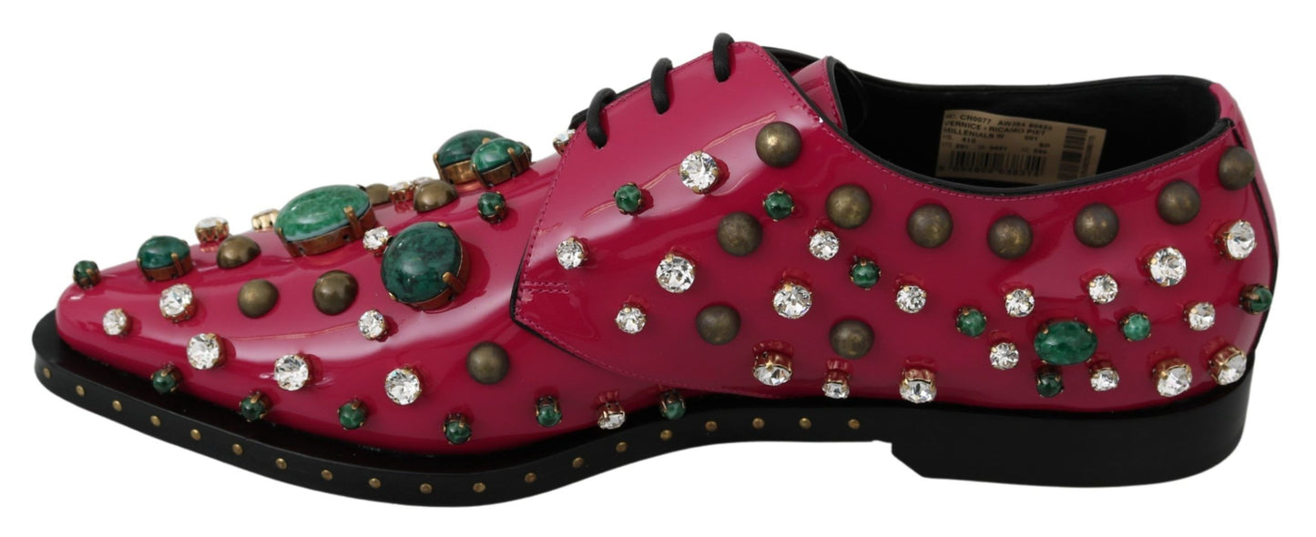 Premium patent leather fuchsia pink flats with iconic logo details from Dolce & Gabbana