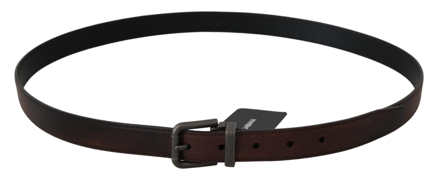 Luxury Dolce & Gabbana belt crafted from the finest leather in a rich brown hue, featuring a subtle gray buckle and iconic logo detail