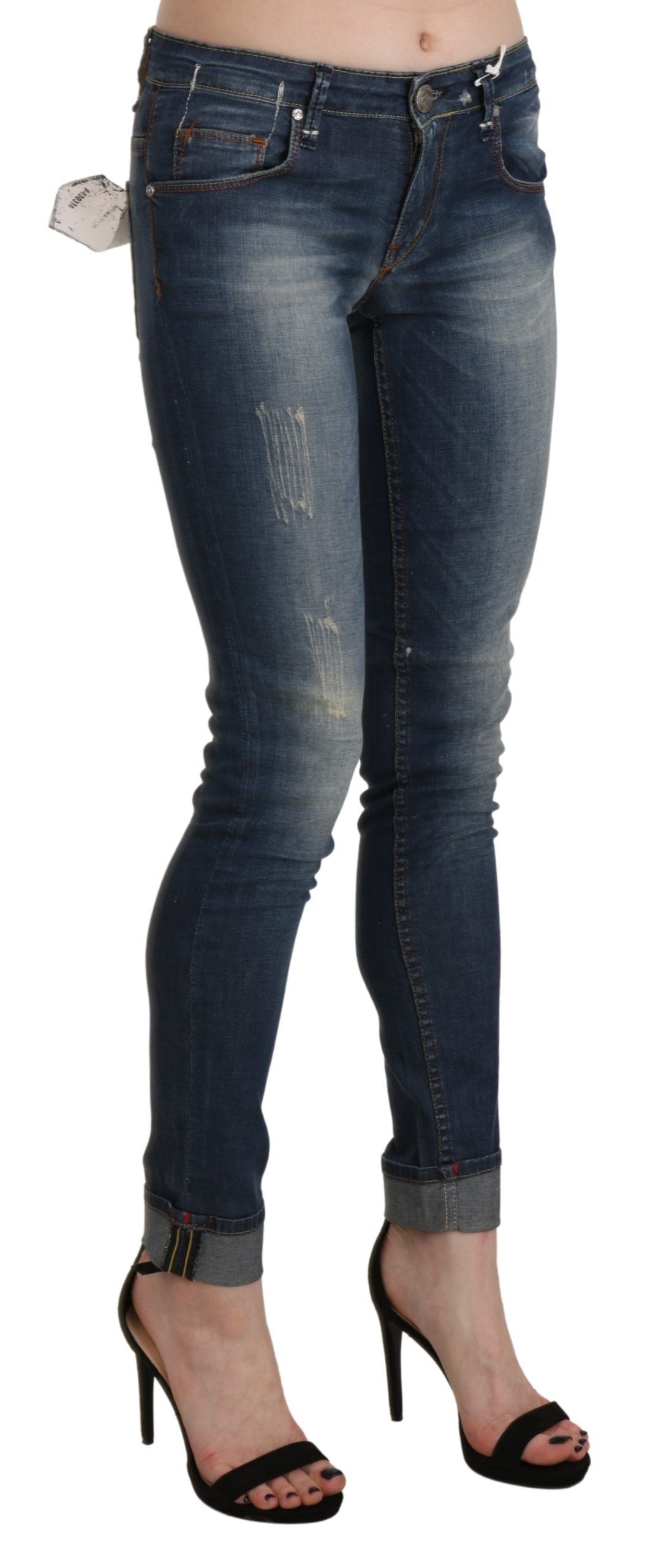 Blue washed skinny cropped jeans with distressed details, perfect for casual wear