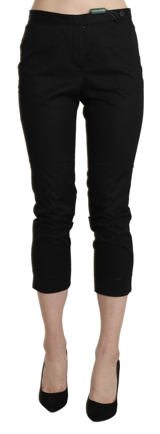 High-waist black skinny cropped pants with sleek zipper closure