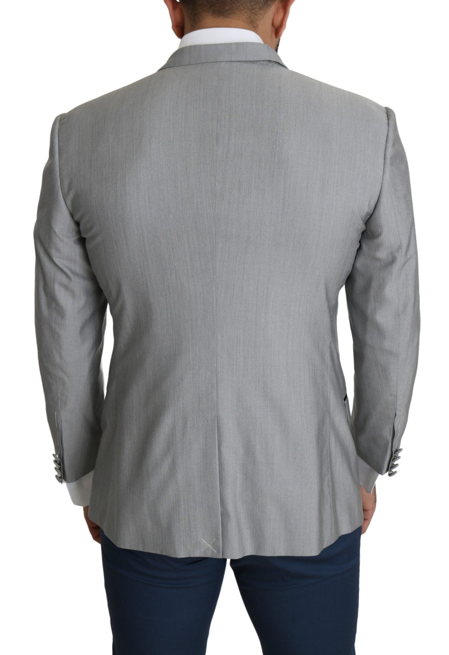 Slim fit blazer crafted from luxurious blend of silk, virgin wool, and polyester