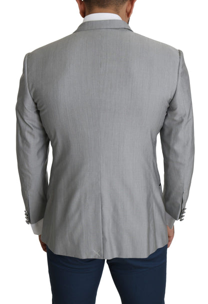 Slim fit blazer crafted from luxurious blend of silk, virgin wool, and polyester