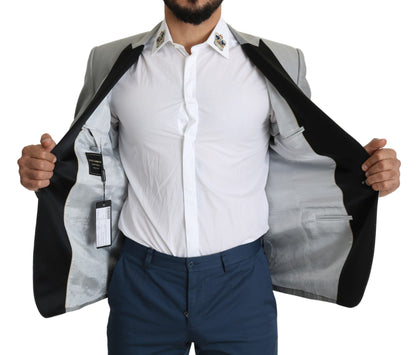 Light Gray blazer with three inside pockets and one open vent in the back
