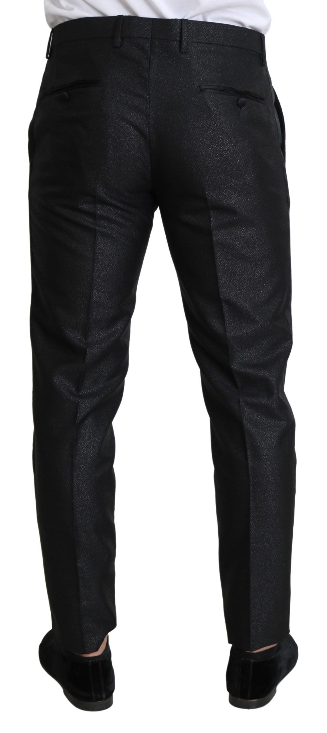 Elegant and sophisticated trousers with polished black hue and refined style details