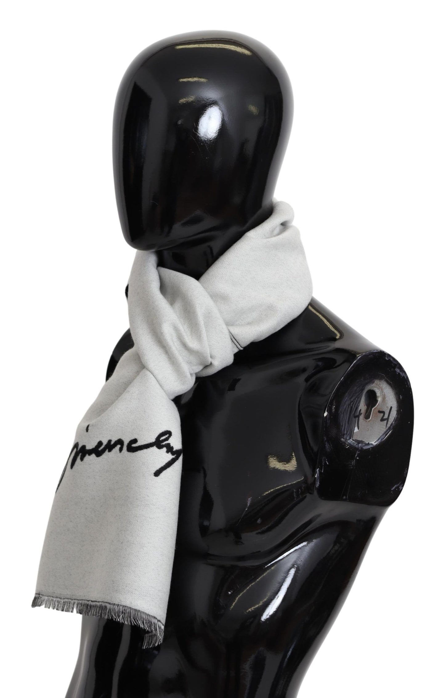 Luxurious Givenchy scarf crafted from 84% Wool, 8% Virgin Wool, 8% Silk