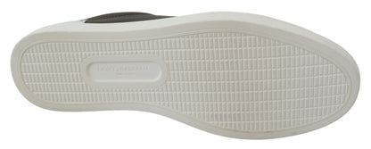 Luxurious Italian-crafted white leather sneakers with iconic logo details