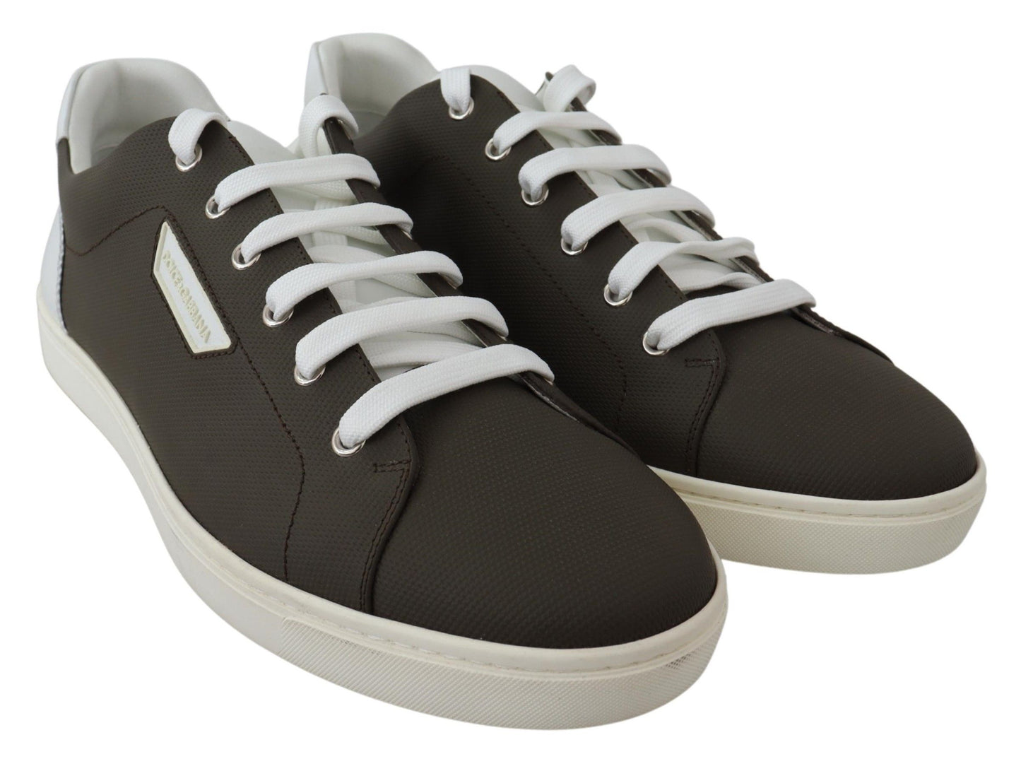 Stylish and pristine white leather low top sneakers by Dolce & Gabbana