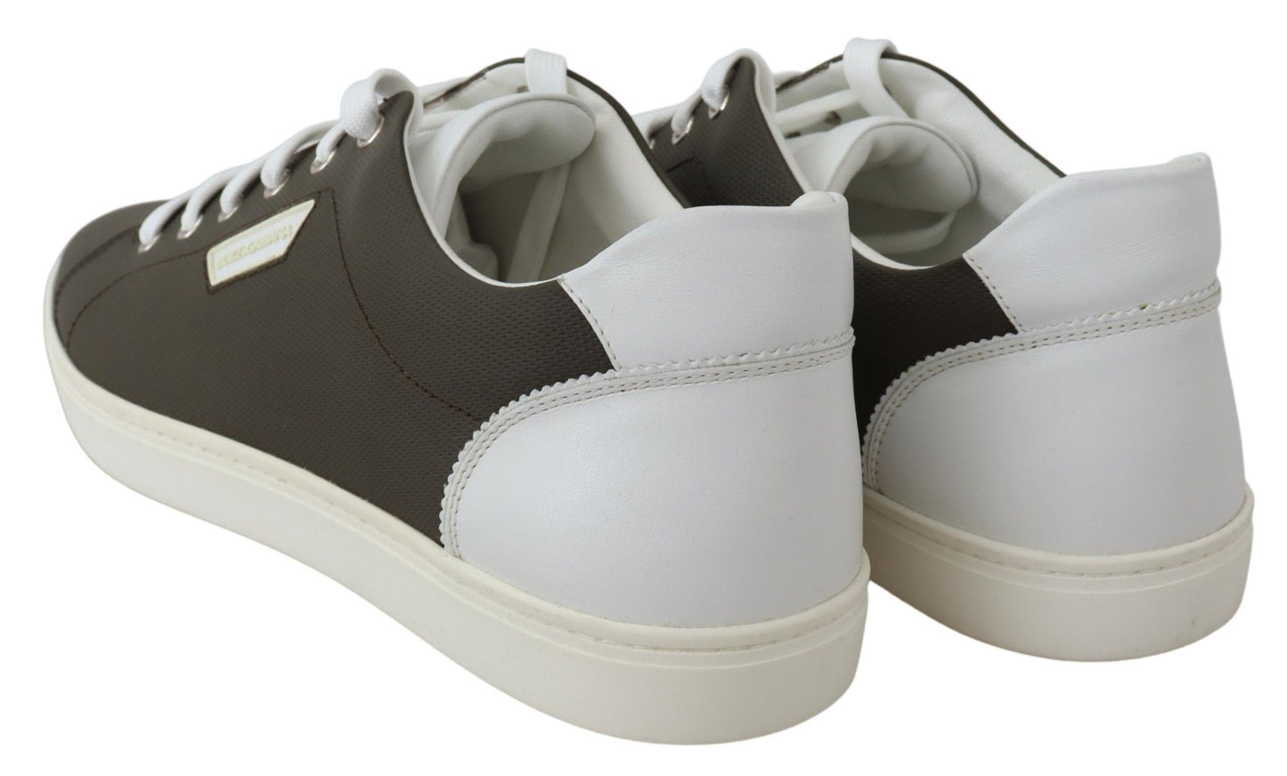 Iconic logo details and subtle green highlights on white leather sneakers