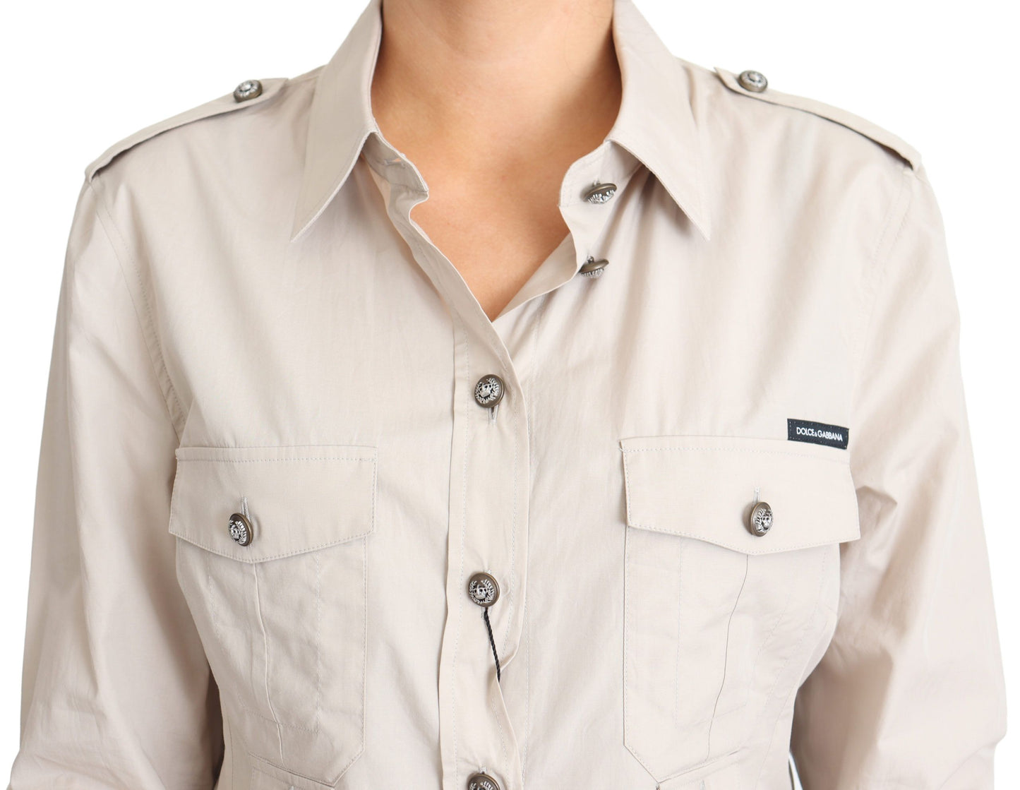  Flared silhouette with four front flap button pockets 