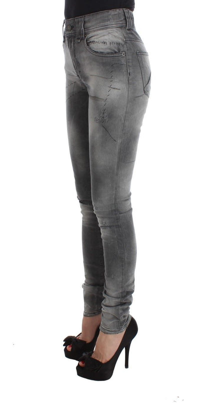 Brand new John Galliano jeans in gray color with tags, ensuring 100% authenticity and Italian craftsmanship