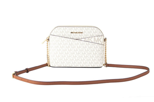Michael Kors Jet Set Travel Medium Leather X Cross Dome Crossbody Handbag in Vanilla Signature with Gold Accents, featuring 2 Inner Slip Pockets, 1 Outer Slip Pocket, and an Adjustable Chain Accented Crossbody Strap