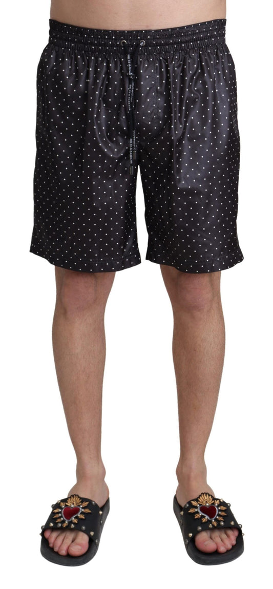 Dolce & Gabbana Chic Black Polka Dot Men's Swim Trunks with stylish polka dot print and drawstring tie fastening