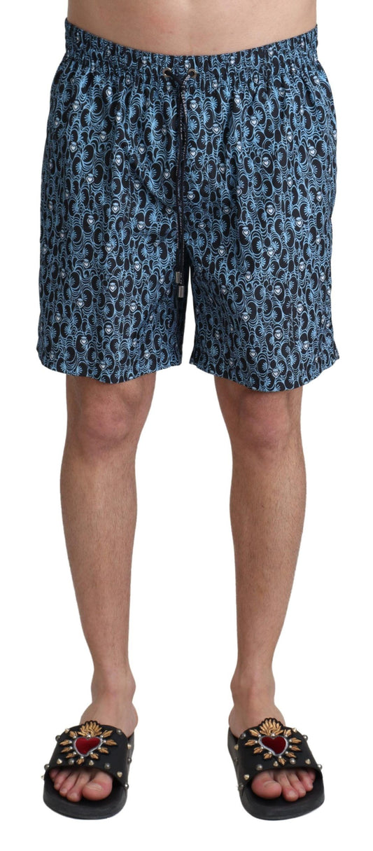 Dolce & Gabbana Chic Blue Drawstring Swim Trunks in vivid blue with elastic waist strap and logo details