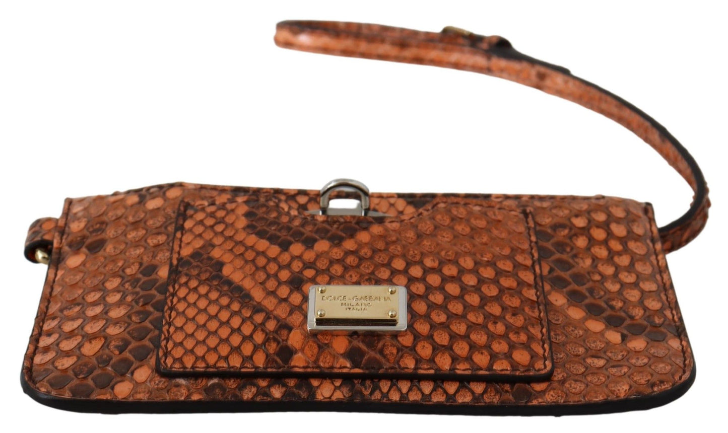 Sophisticated Dolce & Gabbana wristlet adorned with logo engraved gold metal detailing