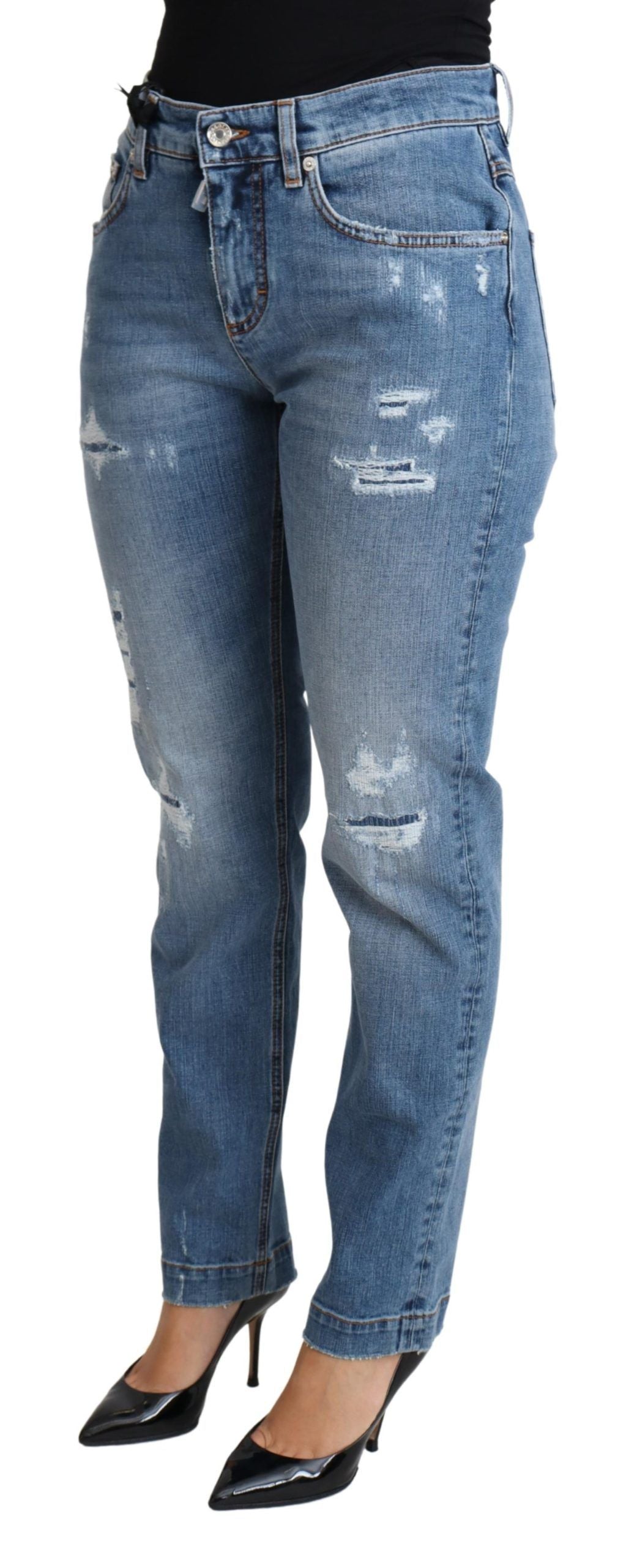 Italian-made skinny jeans with tattered details and iconic logo