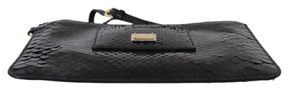 Elegant Italian-crafted black wristlet wallet with comfortable wrist strap