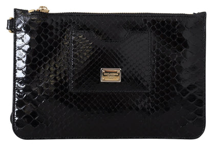 Exotic black leather wristlet wallet with python pattern and gold hardware