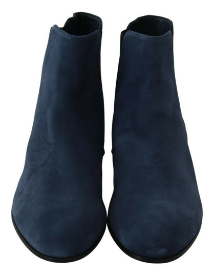 Luxury mid-calf boots with tags, attention to detail, and sophistication