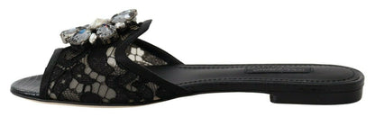 Dolce & Gabbana Elegant Black Lace Mules with Jewel Flower Detail - Luxury Italian designer footwear with intricate lace design and embellished flower detail