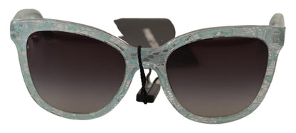 Luxurious Italian craftsmanship with shimmering crystal acetate and lace detail