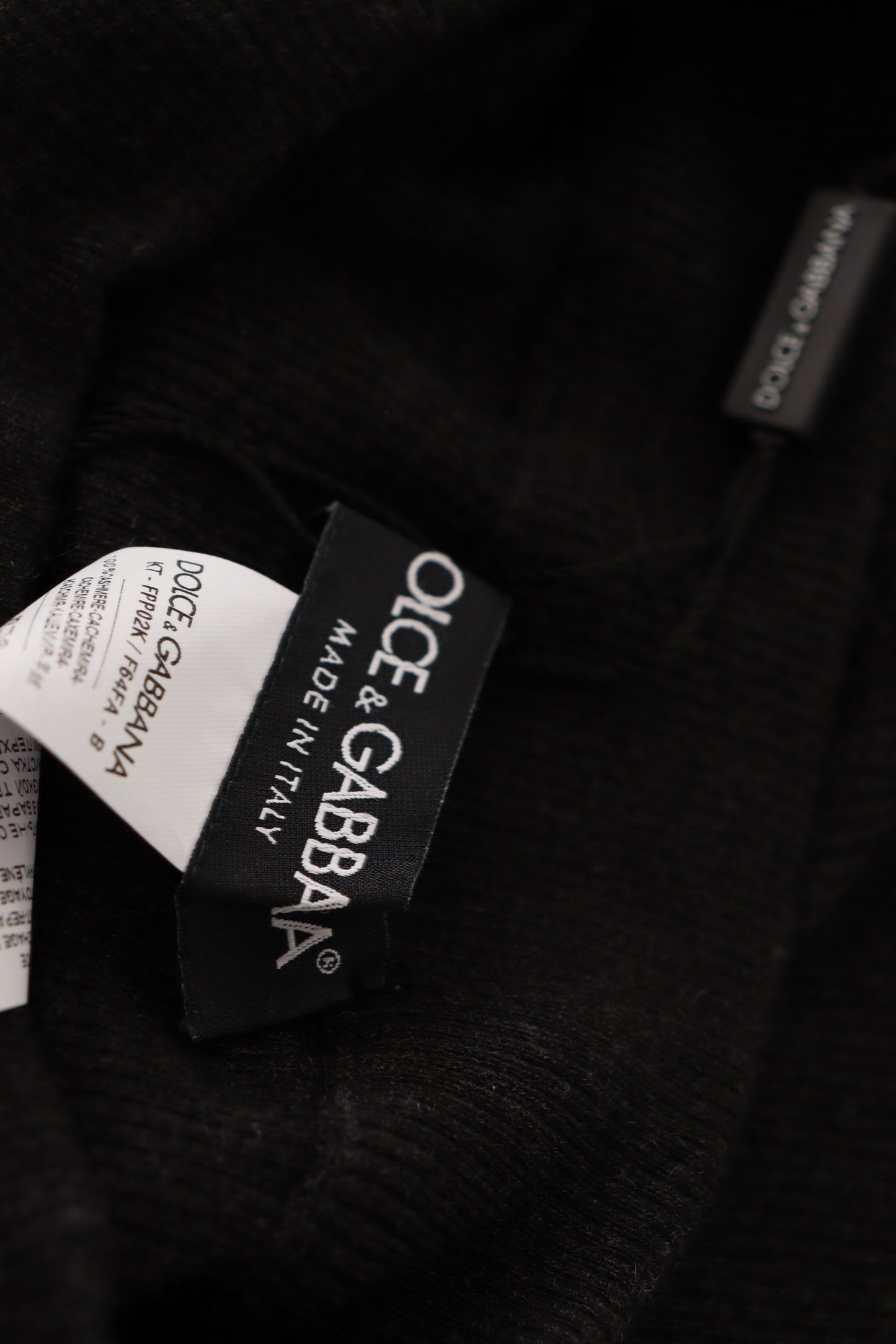 Gray cashmere tights with logo details, offering unmatched comfort and style