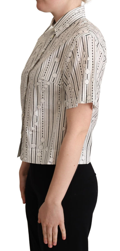 Short-sleeved polo top featuring a modern geometric design and front button placket
