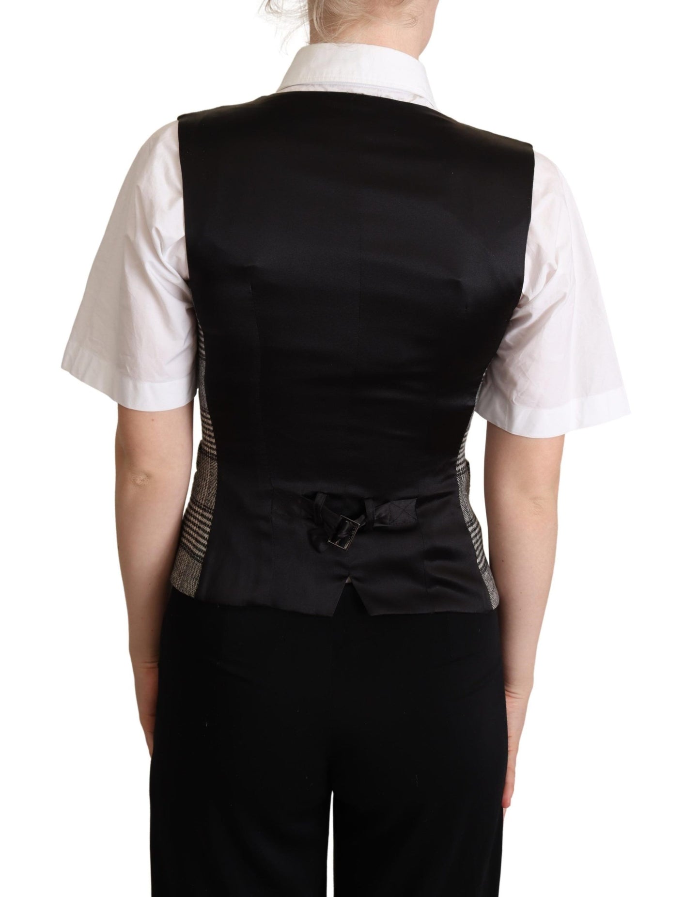 Close-up of Dolce & Gabbana waistcoat with logo details