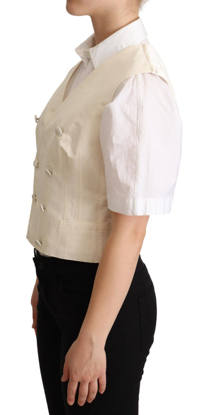 Close up of the logo details on Dolce & Gabbana Beige Silk Blend Sleeveless Vest
