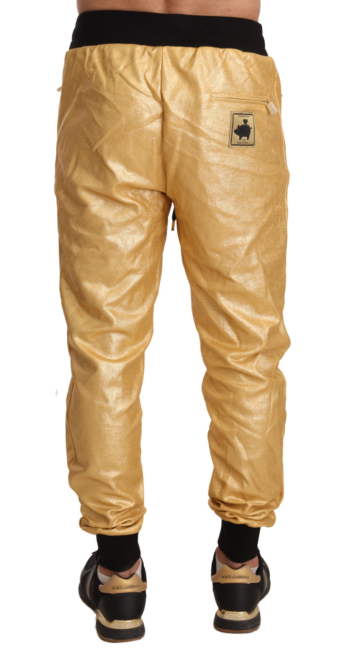 Gold Dolce & Gabbana Sweatpants with adjustable elastic waistband and zipper pockets