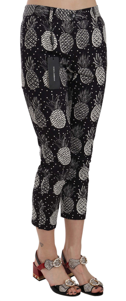 Italian-designed, brand new with tags, black capri pants with white pineapple print