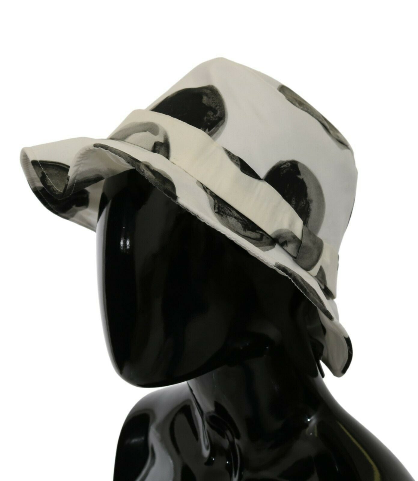 Elegant white bucket hat with playful black polka dots