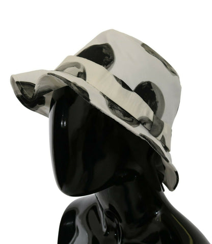 Elegant white bucket hat with playful black polka dots