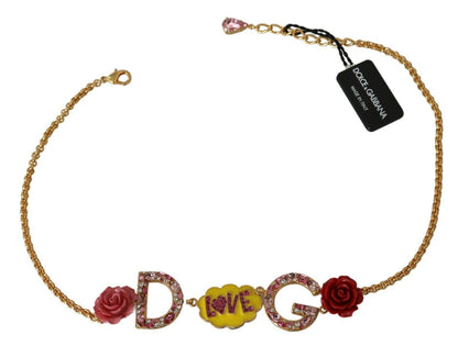 Impeccable Italian elegance in a gold statement necklace with pink and clear crystals and quirky ‘Fumetti Cartoons’ motif
