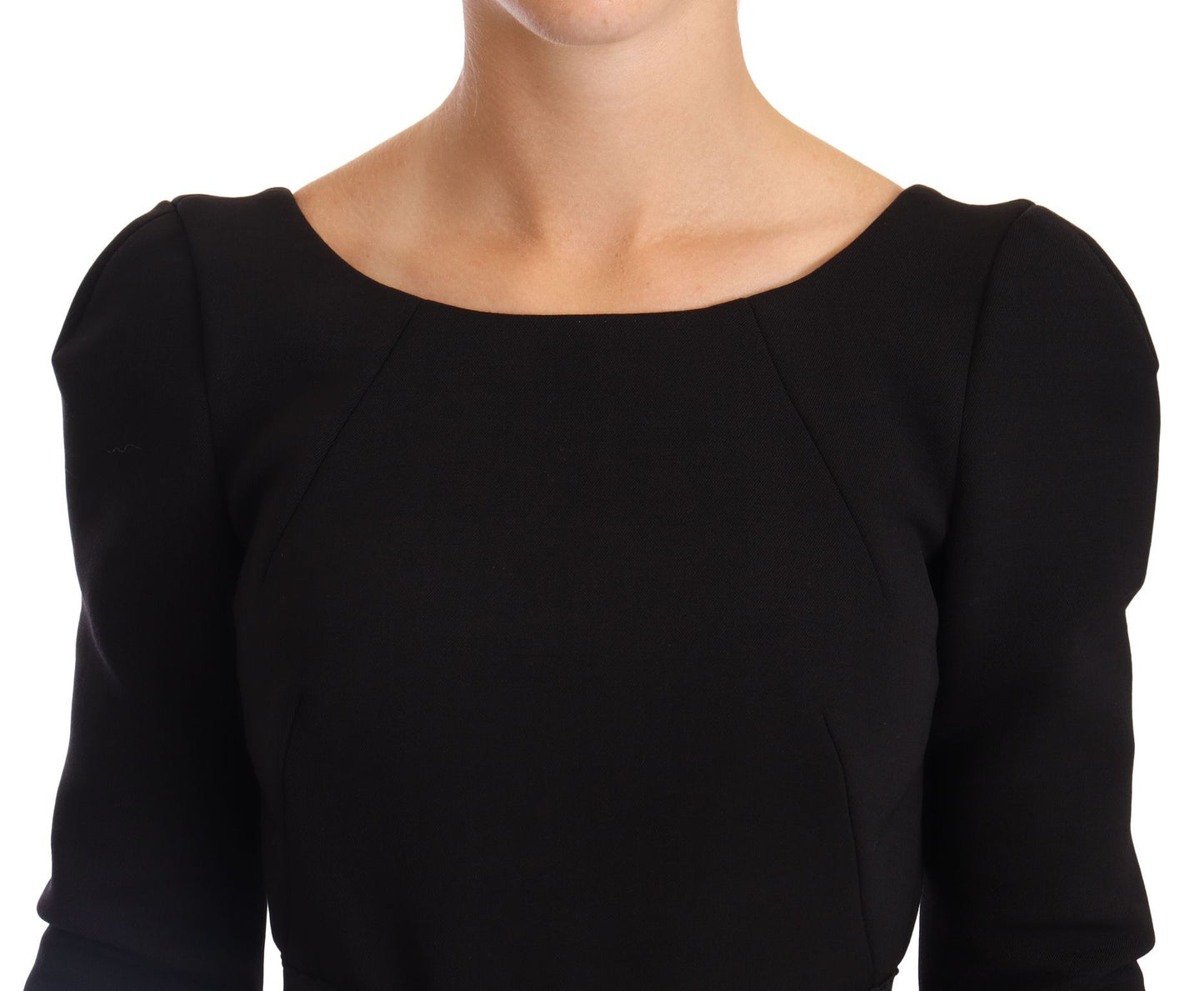 Sophisticated sheath dress with open back, blending elegance and sensuality