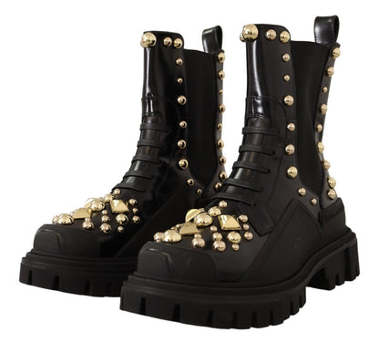 High fashion black leather combat boots with rubber soles and gold studs