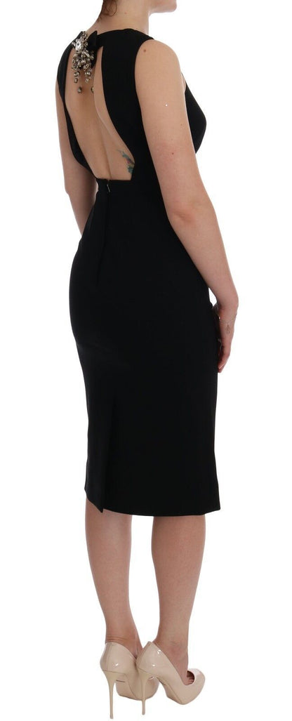 High Italian craftsmanship and exclusivity in this stunning knee-length dress