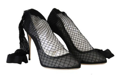 Comfortable and stylish black pumps with distinctive logo details