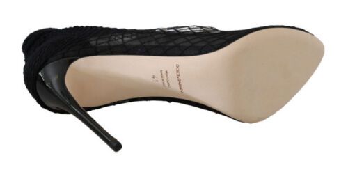 Black pumps made from synthetic materials and luxurious leather sole
